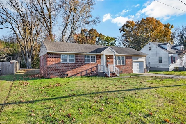 single story home with a front yard and a garage