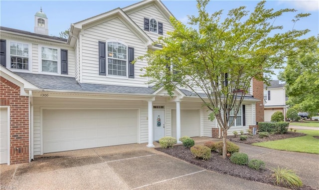 view of front of property featuring a garage