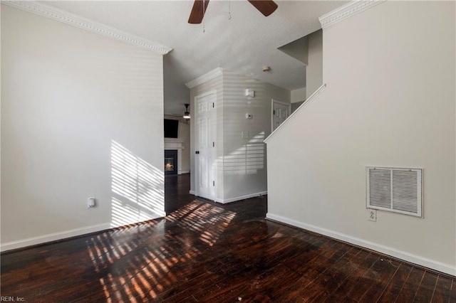 unfurnished living room featuring hardwood / wood-style floors, ceiling fan, and ornamental molding