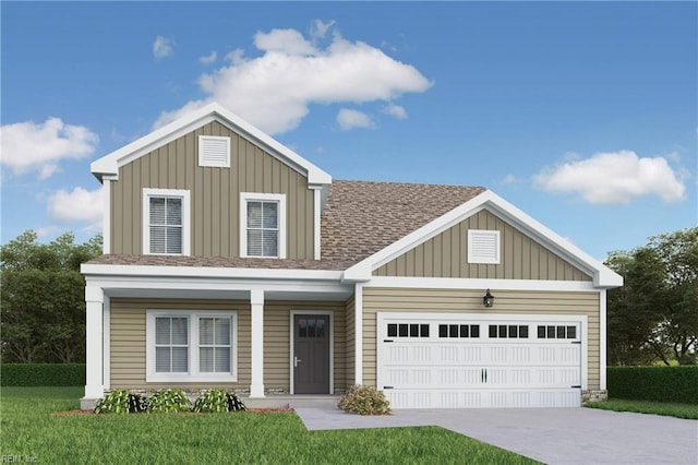 view of front facade featuring a garage and a front lawn