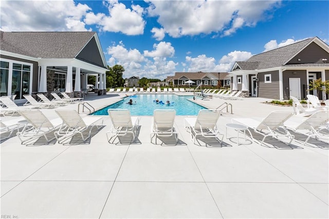 view of swimming pool featuring a patio