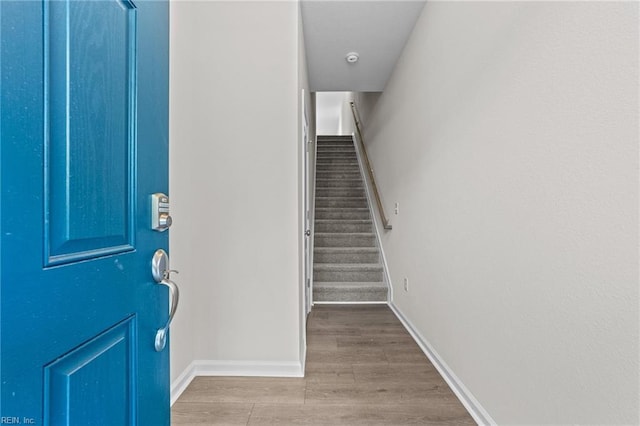 foyer entrance with light wood-type flooring