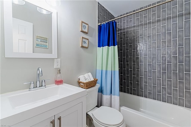 full bathroom featuring vanity, toilet, and shower / tub combo