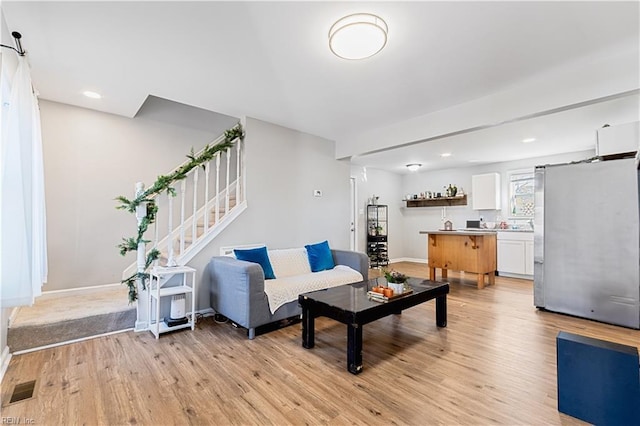 living room featuring light wood-type flooring