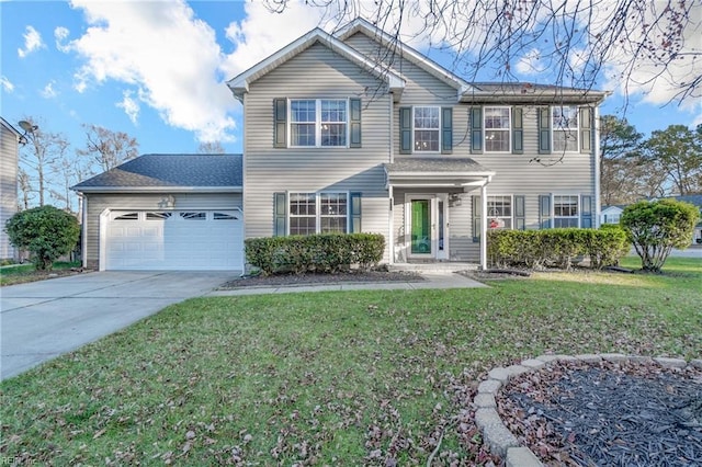 view of front of property featuring a front yard and a garage