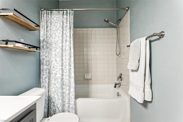 full bathroom featuring vanity, toilet, and shower / bath combo with shower curtain