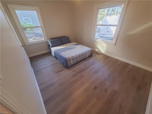 bedroom featuring hardwood / wood-style floors