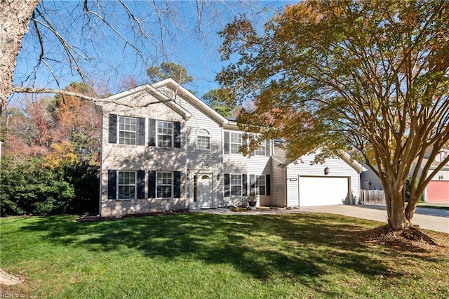 view of front of house featuring a garage and a front yard