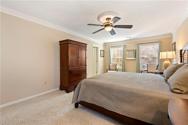 bedroom with ceiling fan, light colored carpet, and crown molding