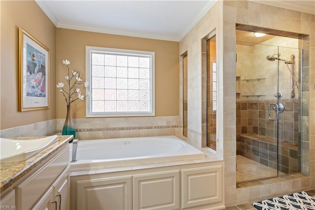 bathroom featuring vanity, ornamental molding, and shower with separate bathtub