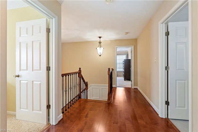 hallway featuring hardwood / wood-style flooring