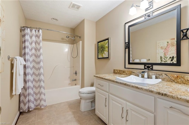 full bathroom featuring tile patterned floors, vanity, shower / tub combo, and toilet