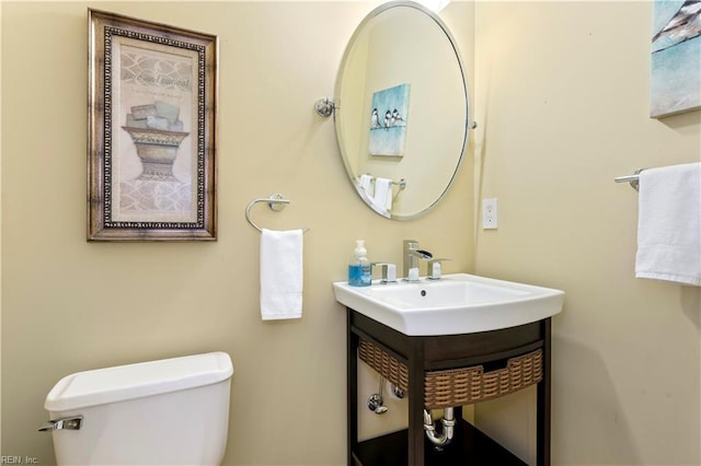 bathroom with sink and toilet