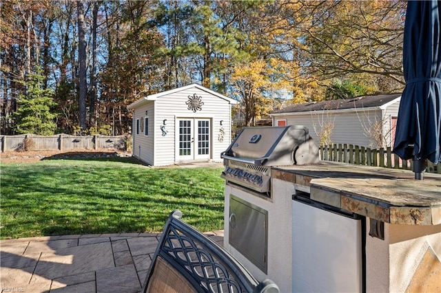 view of patio featuring area for grilling and an outdoor kitchen