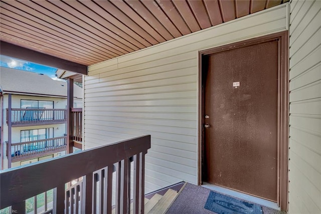 doorway to property featuring a balcony