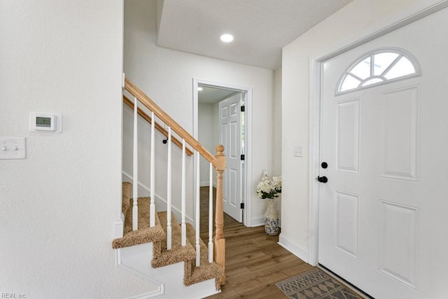 foyer with hardwood / wood-style flooring