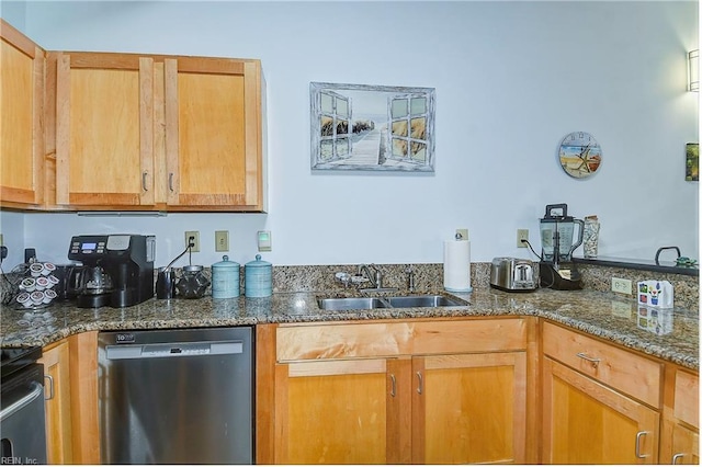 kitchen with stainless steel dishwasher, dark stone countertops, sink, and black range oven