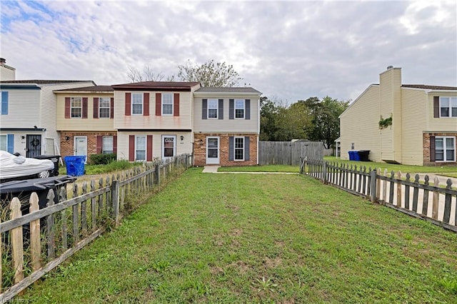 view of front of home featuring a front lawn