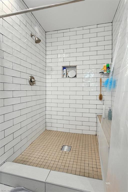 bathroom with walk in shower