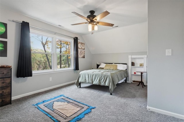 bedroom featuring ceiling fan, carpet floors, and lofted ceiling