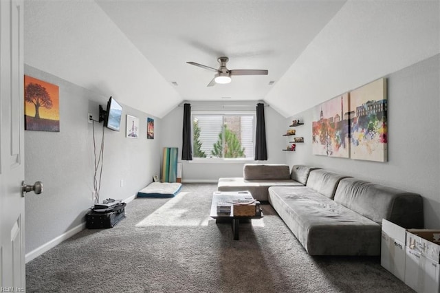 carpeted living room featuring ceiling fan and lofted ceiling