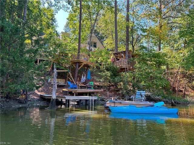 dock area featuring a water view