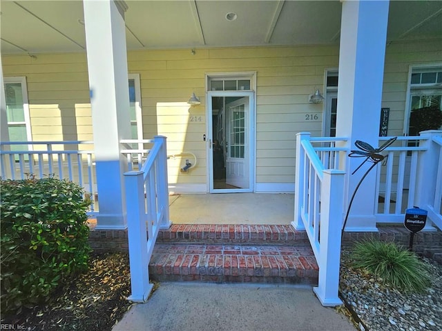 doorway to property with covered porch