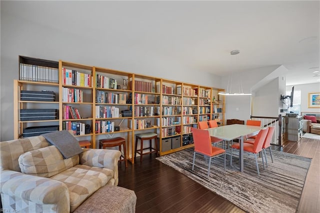 living area with dark hardwood / wood-style floors