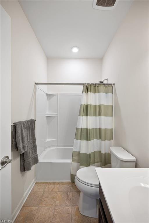 full bathroom with shower / bath combination with curtain, vanity, and toilet