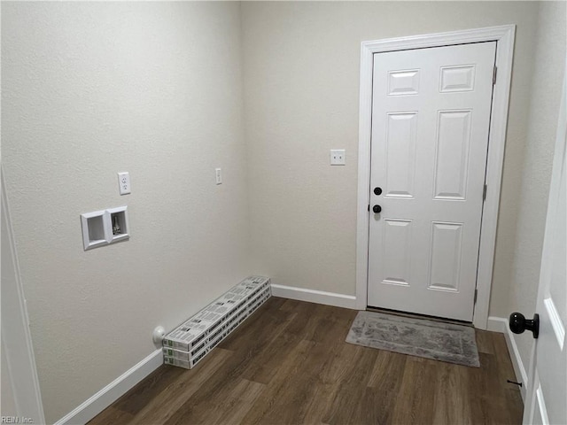 laundry area with dark hardwood / wood-style floors