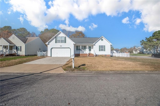 view of front of property with a porch, a garage, and a front lawn