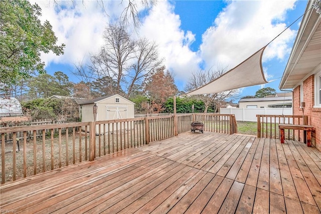 wooden deck featuring a storage shed