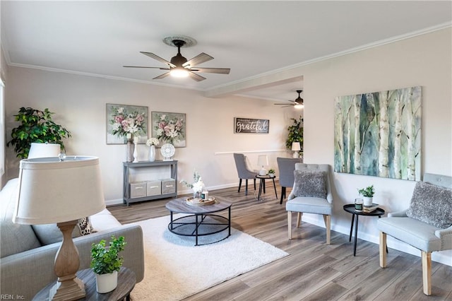 living room featuring hardwood / wood-style floors and ornamental molding