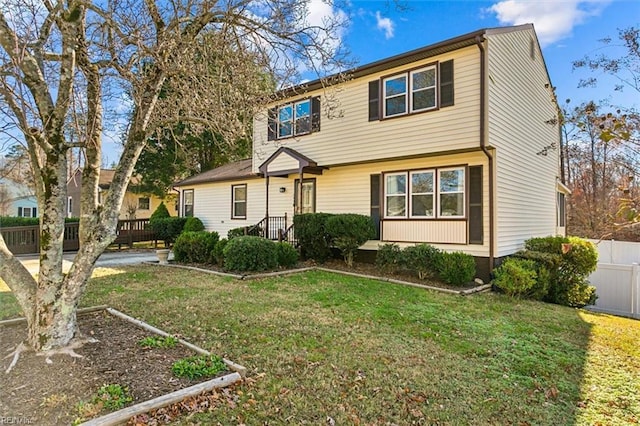 view of front facade with a front yard