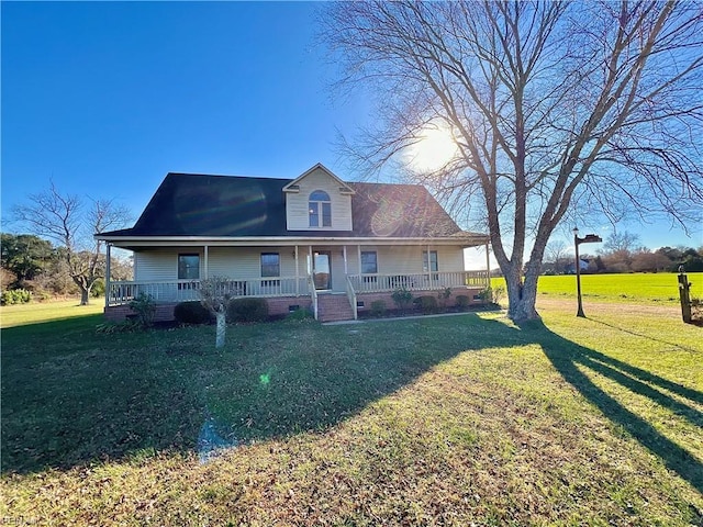 view of front of home with a front lawn and a porch