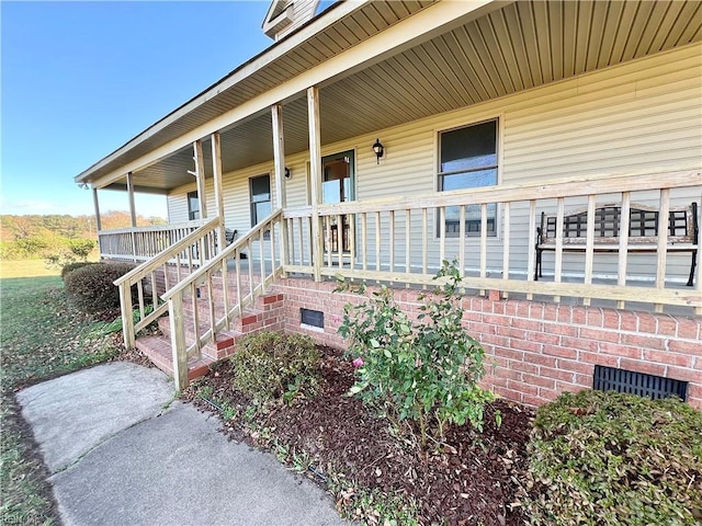 property entrance with a porch