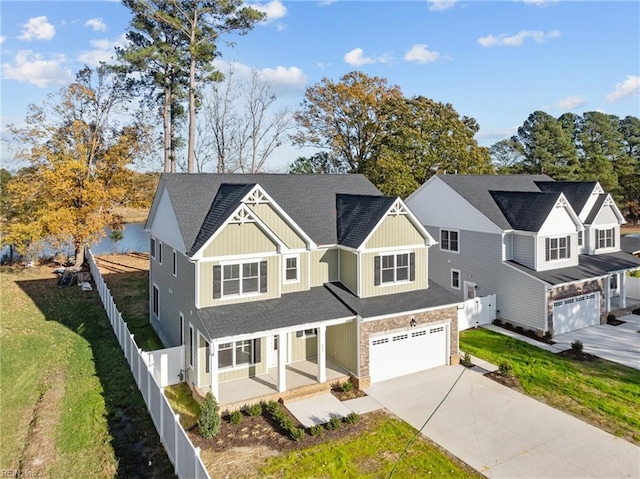 view of front of home featuring a garage and a front lawn