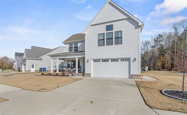 view of front facade featuring a porch and a garage