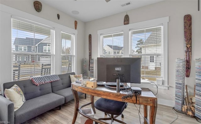 home office featuring light hardwood / wood-style floors