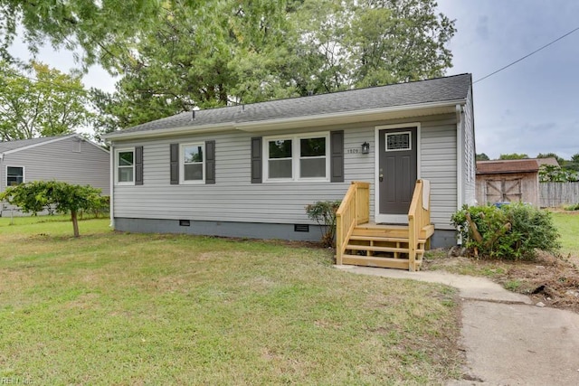 view of front facade featuring a front yard