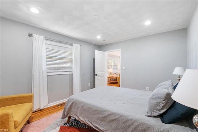 bedroom featuring wood-type flooring