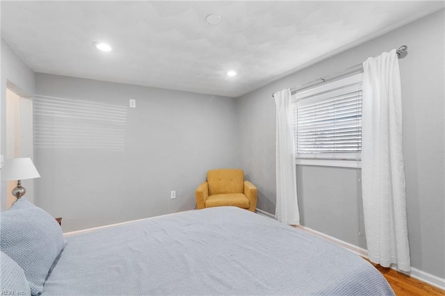 bedroom featuring wood-type flooring