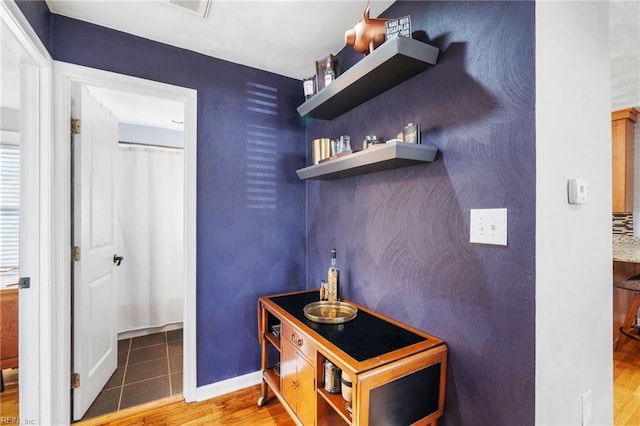 bathroom featuring wood-type flooring