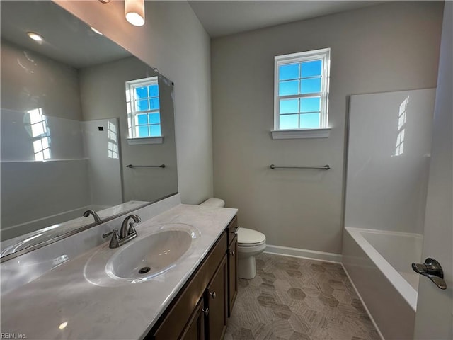 full bathroom featuring vanity, shower / washtub combination, and toilet