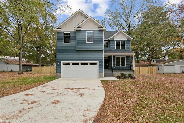 view of front facade with a porch and a garage