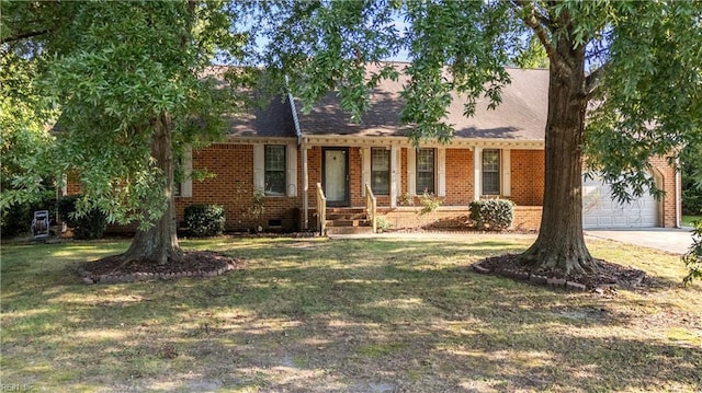 view of front of property with a garage and a front yard