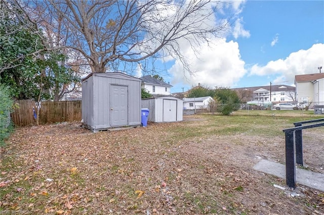 view of yard with a storage unit