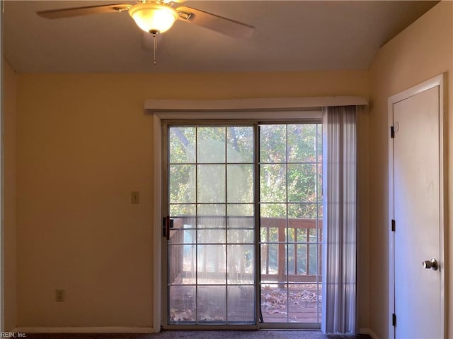 doorway featuring carpet floors