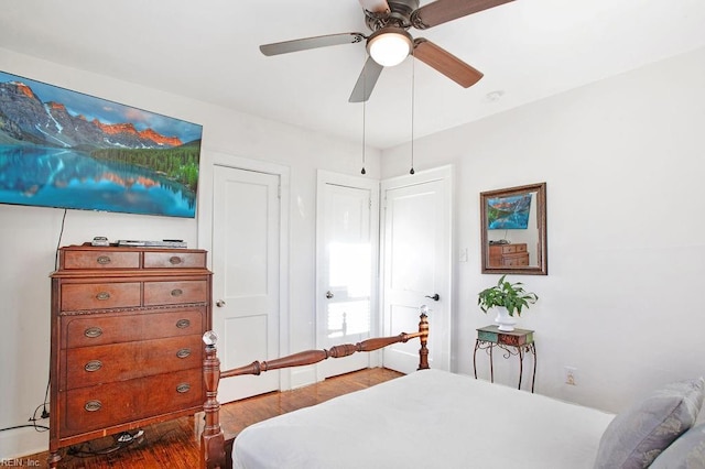 bedroom featuring ceiling fan and wood-type flooring