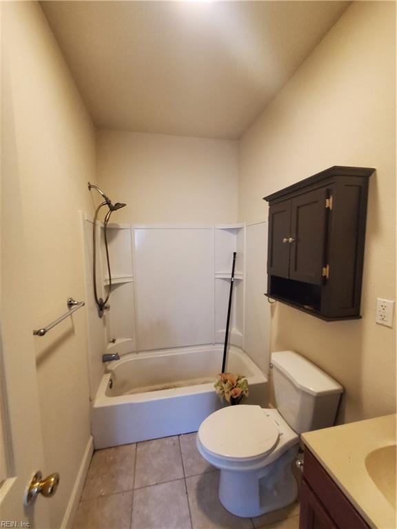 full bathroom with tile patterned flooring, vanity, shower / bathtub combination, and toilet